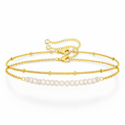 DOS PULSERAS 18K VERGOLDET MIT PERLEN